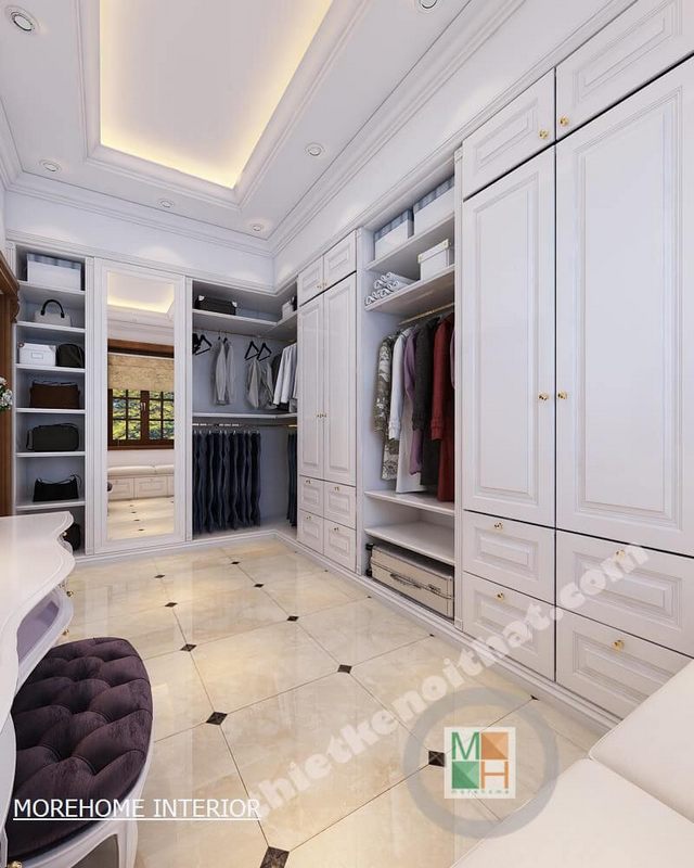 Thiết kế phòng thay đồ riêng tạo không gian rộng, thoải mái hơn cho gia chủ với nội thất gỗ tông màu trắng ấn tượng, sang trọng